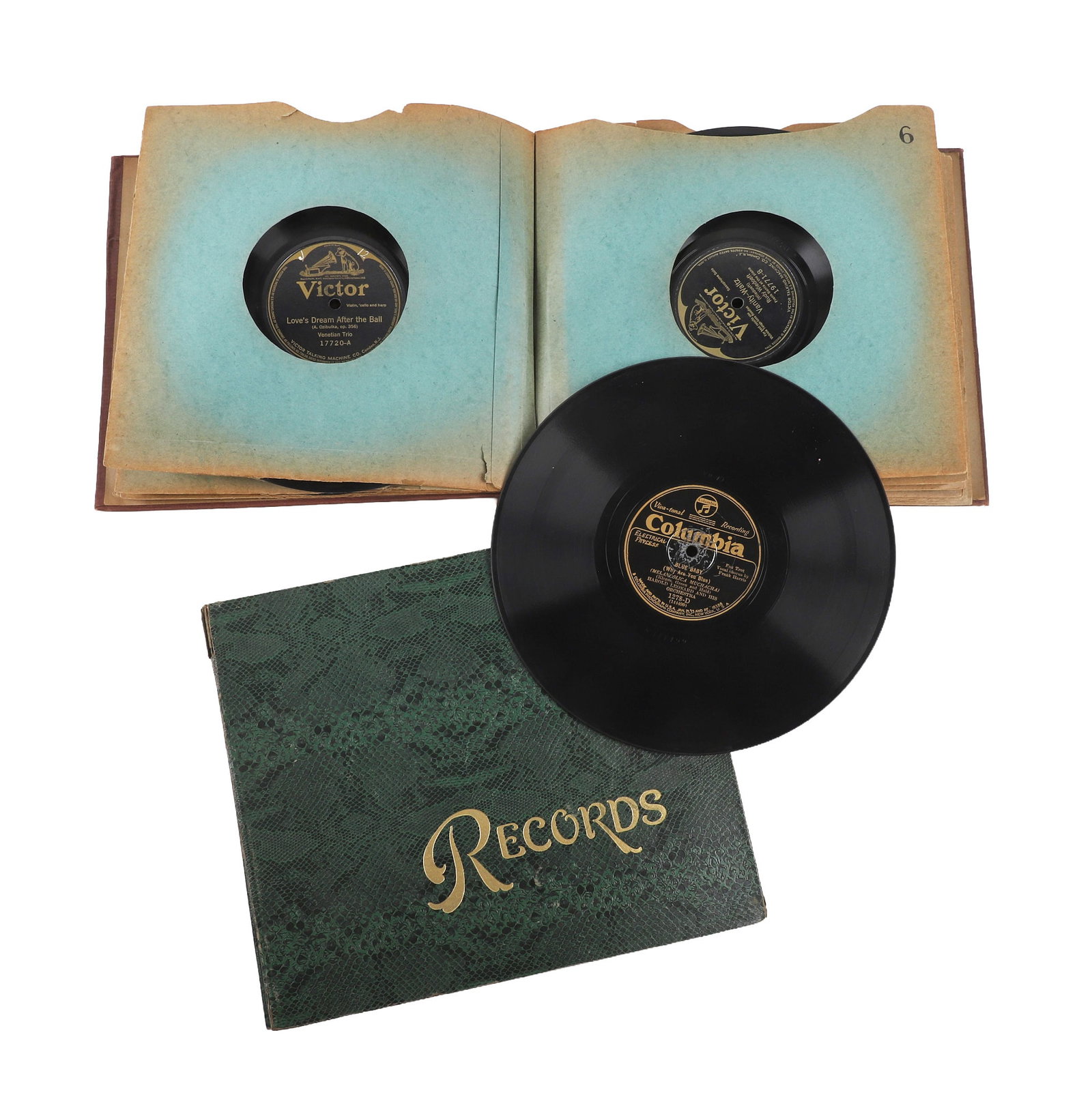 (2) Victrola Record Albums: (2) Victrola Record Albums (2) Victrola record albums with records from Columbia, RCA Victor, Varsity & more. Many genres from instrumentals to pop standards.