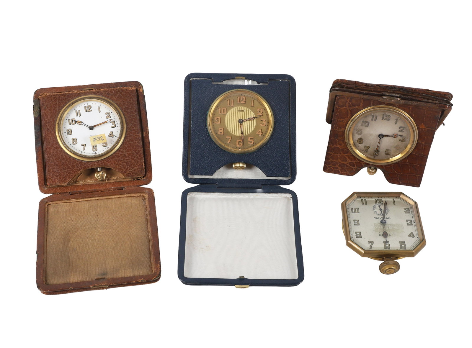 Group of (4) Antique Automobile Dashboard Clocks: Group of (4) Antique Automobile Dashboard Clocks Automobiliana. Collection comprised of an octagonal Waltham, a Schild Co./Octava Co. Swiss 8 day, an unidentified French clock in a leather wallet,