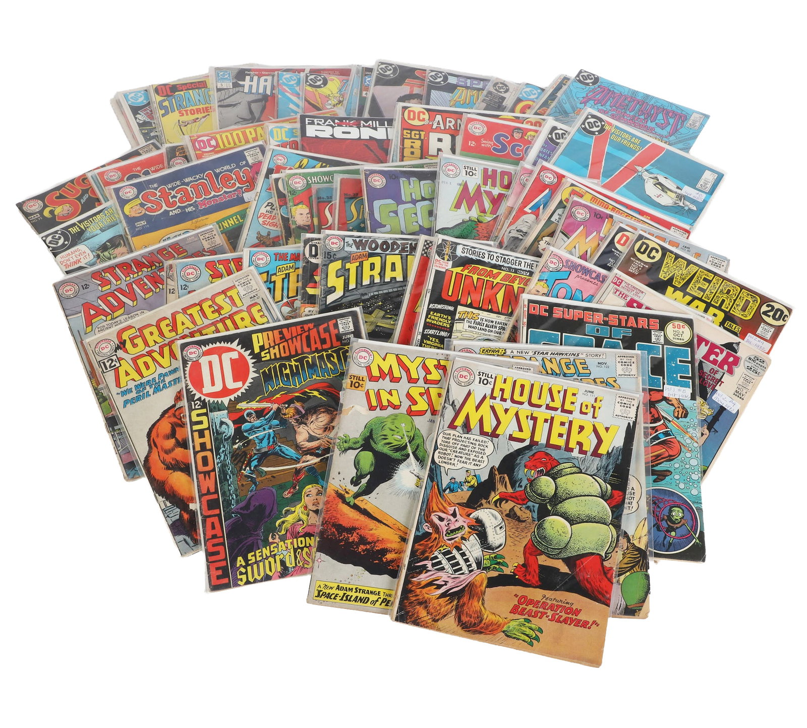 Vintage DC Comics Collection: Vintage DC Comics Collection (62) Collection of Silver & Bronze Age DC comic books including Weird Wars, House of Mystery, Strange Adventures, V, (2) 1940s Star-Spangled Comics, Frank Miller's 'Ronin'
