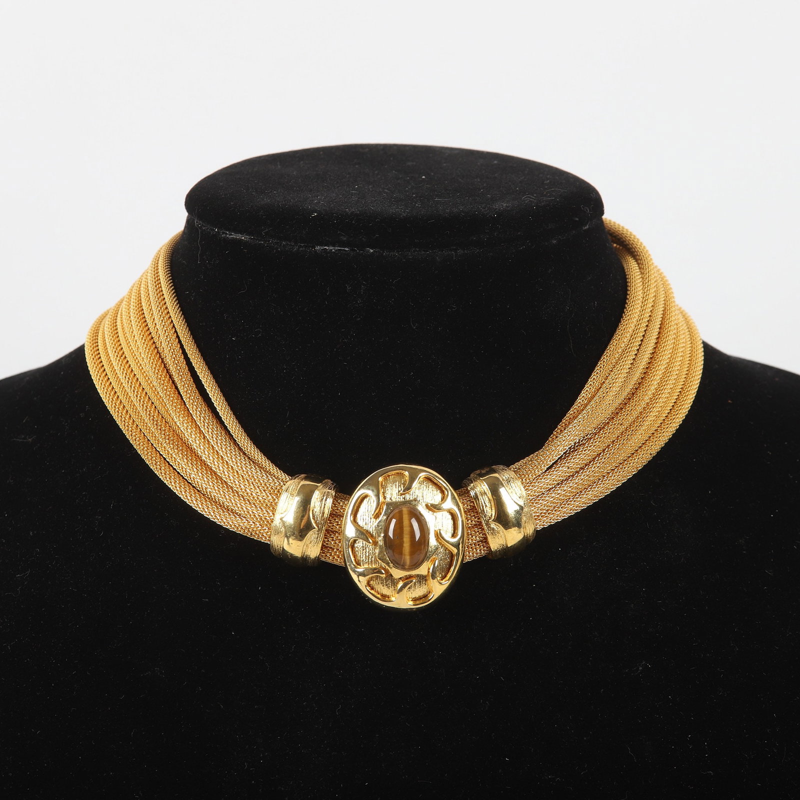 Signed Ron Rizzo Multi Strand Mesh Necklace: Signed Ron Rizzo Multi Strand Mesh Necklace Signed Ron Rizzo gold tone multi strand mesh necklace, center tiger eye style cabochon accent, hook clasp closure