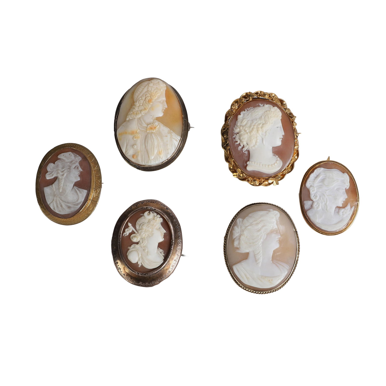 (6) Group Of Carved Shell Cameo Brooches, One Marked OXO 830: (6) Group Of Carved Shell Cameo Brooches, One Marked OXO 830 Group of 6 vintage carved shell cameo brooches including female portrait profiles in assorted gold tone and silver tone settings with vario