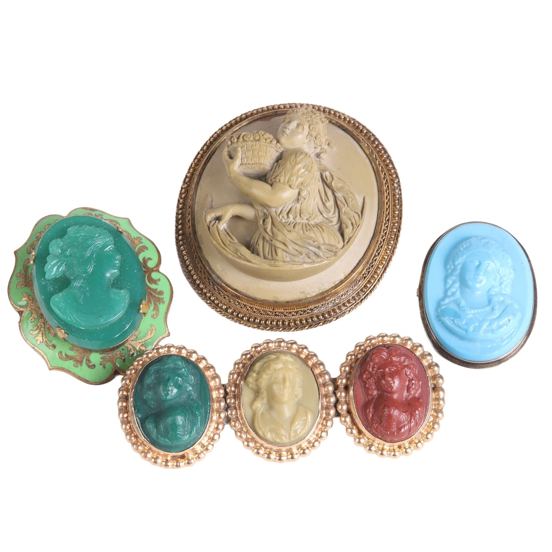 (4) Group of Vintage Cameo Brooches, one marked 14 K on clasp: (4) Group of Vintage Cameo Brooches, one marked 14 K on clasp Group of 4 vintage cameo brooches including a large oval figural cameo of a woman carrying a basket, clasp marked 14K, green cameo