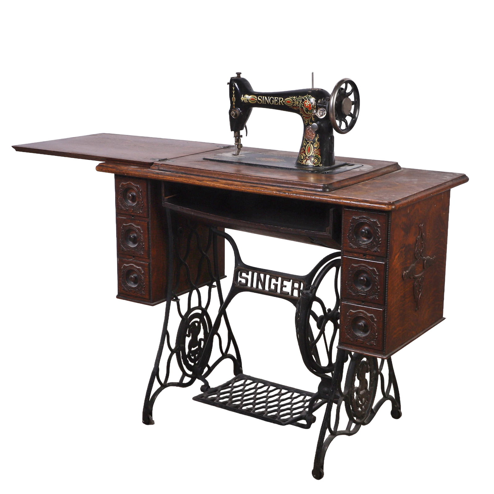 Antique Singer Model 66 Treadle Sewing Machine.: Antique Singer Model 66 Treadle Sewing Machine. Model 66 Red Eye sewing machine on a 6-drawer cast iron treadle table. Serial number G5383496. Table: 30" H x 36" W x 18" D