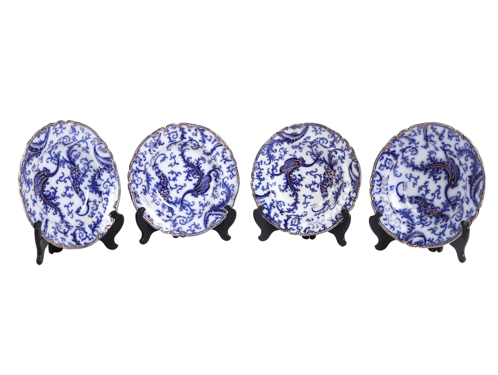 (4) Set of Antique Flow Blue Soup Plates.: (4) Set of Antique Flow Blue Soup Plates. (4) piece set of matching antique flow blue soup plates with gold inlay detailing around vines & dragons. 10 1/2"w, #2730 noted on underside.