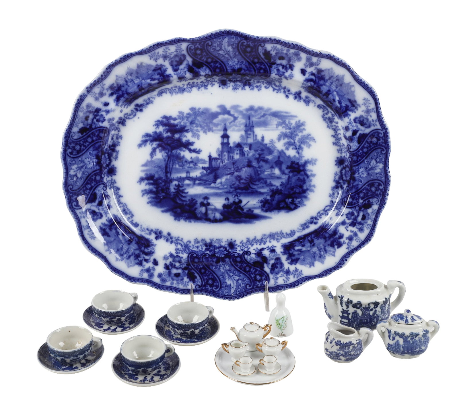 Burgess & Leigh Flow Blue Platter and Two Miniature Tea Sets: Burgess & Leigh Flow Blue Platter and Two Miniature Tea Sets An English flow blue platter, Burgess & Leigh, Middlepoint Pottery, 15 3/4" x 13", and two Miniature Tea Sets including a Blue Willow
