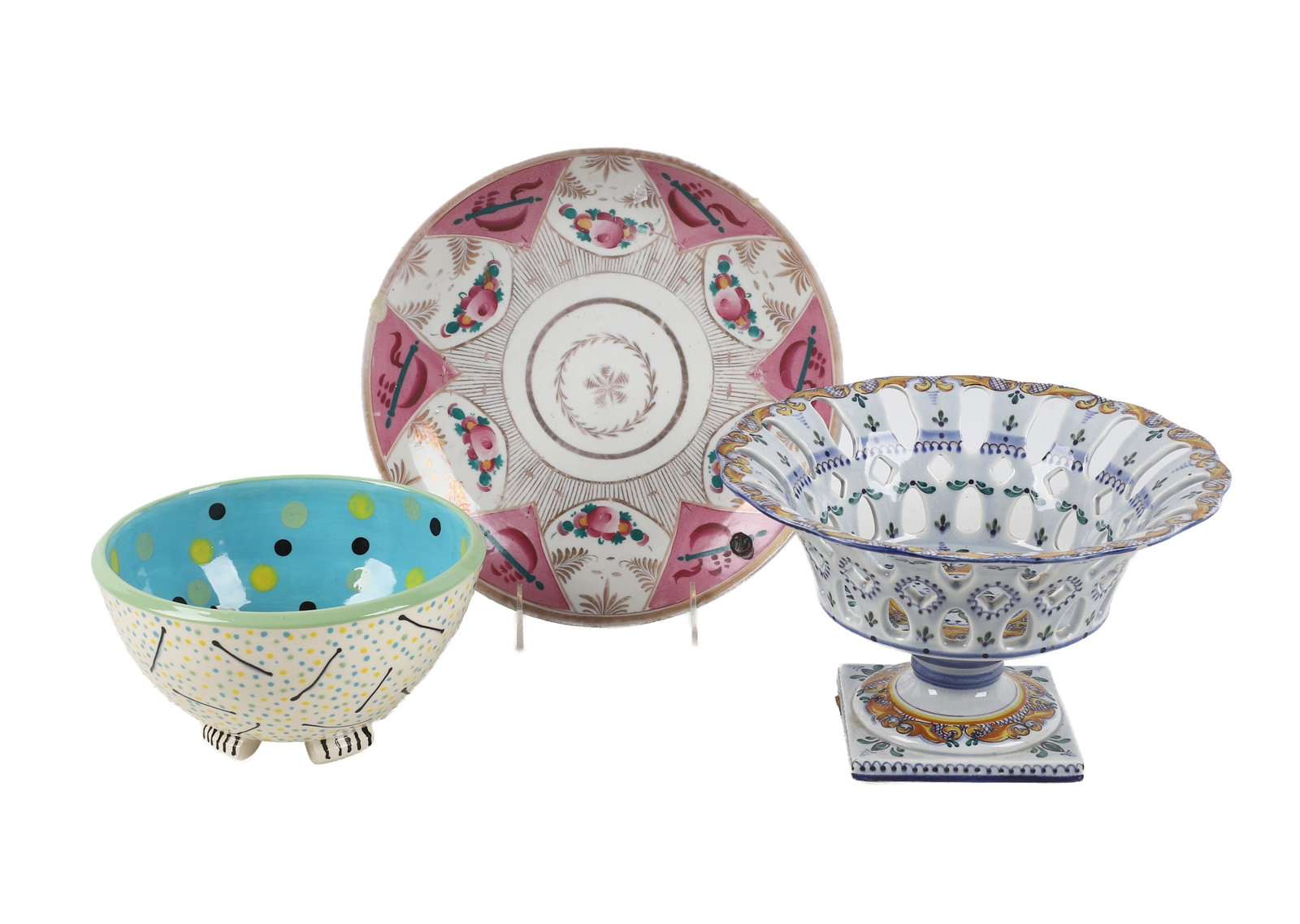 (3) Pieces of Ceramic Tableware: (3) Pieces of Ceramic Tableware (3) Ceramic items to include: 1) Portuguese footed centerpiece bowl with perforated decoration, 9 1/2"W x 5 3/4"H. 2) A pink hand painted plate, likely Chinese, 10