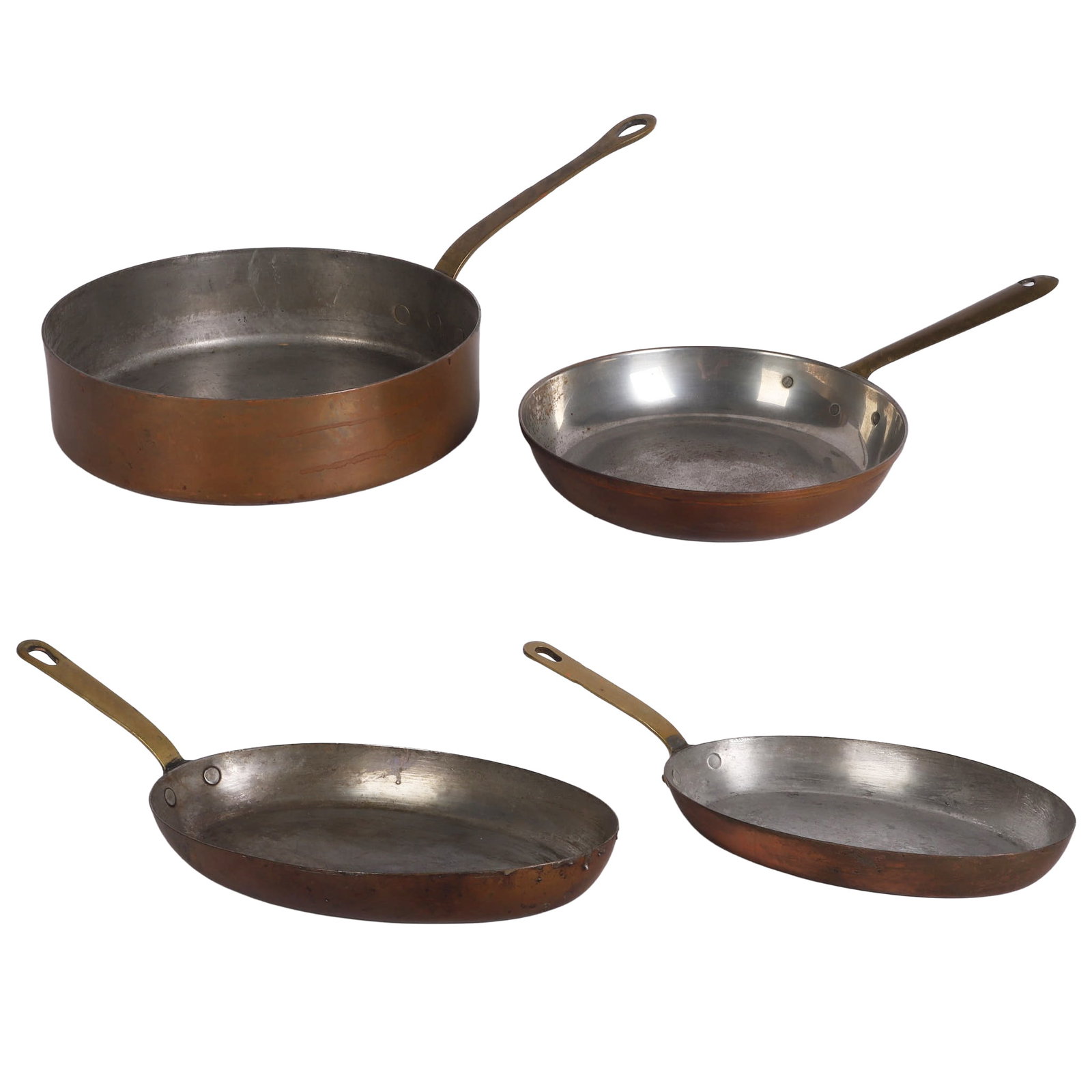 (4) Copper Pans & Skillets: (4) Copper Pans & Skillets (4) Copper pans & skillets including a Waldow saucepan, 9 3/4"W, a skillet, 8 1/4"W, and (2) oval fish skillets marked 'Bazar Francais', the larger 9"W x 14"L pan (patina wi