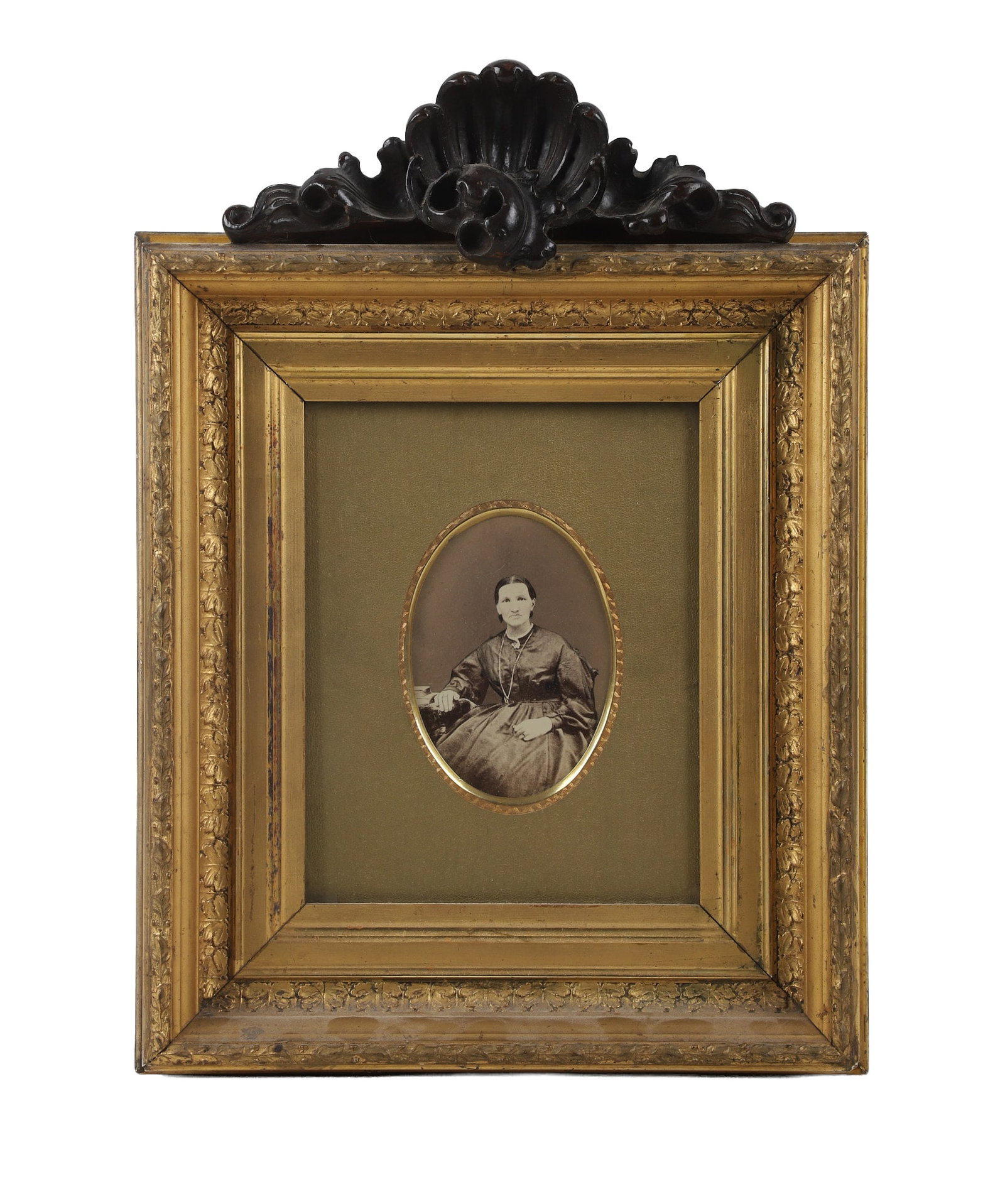 Albumen Portrait, Gilded Victorian Frame: Albumen Portrait, Gilded Victorian Frame A matriarchal portrait in a gilt bezel mat within a fine carved and gilt wood frame. Crested with a carved mahogany, Rococo-style shell. 9.25" H x 7.25" W,
