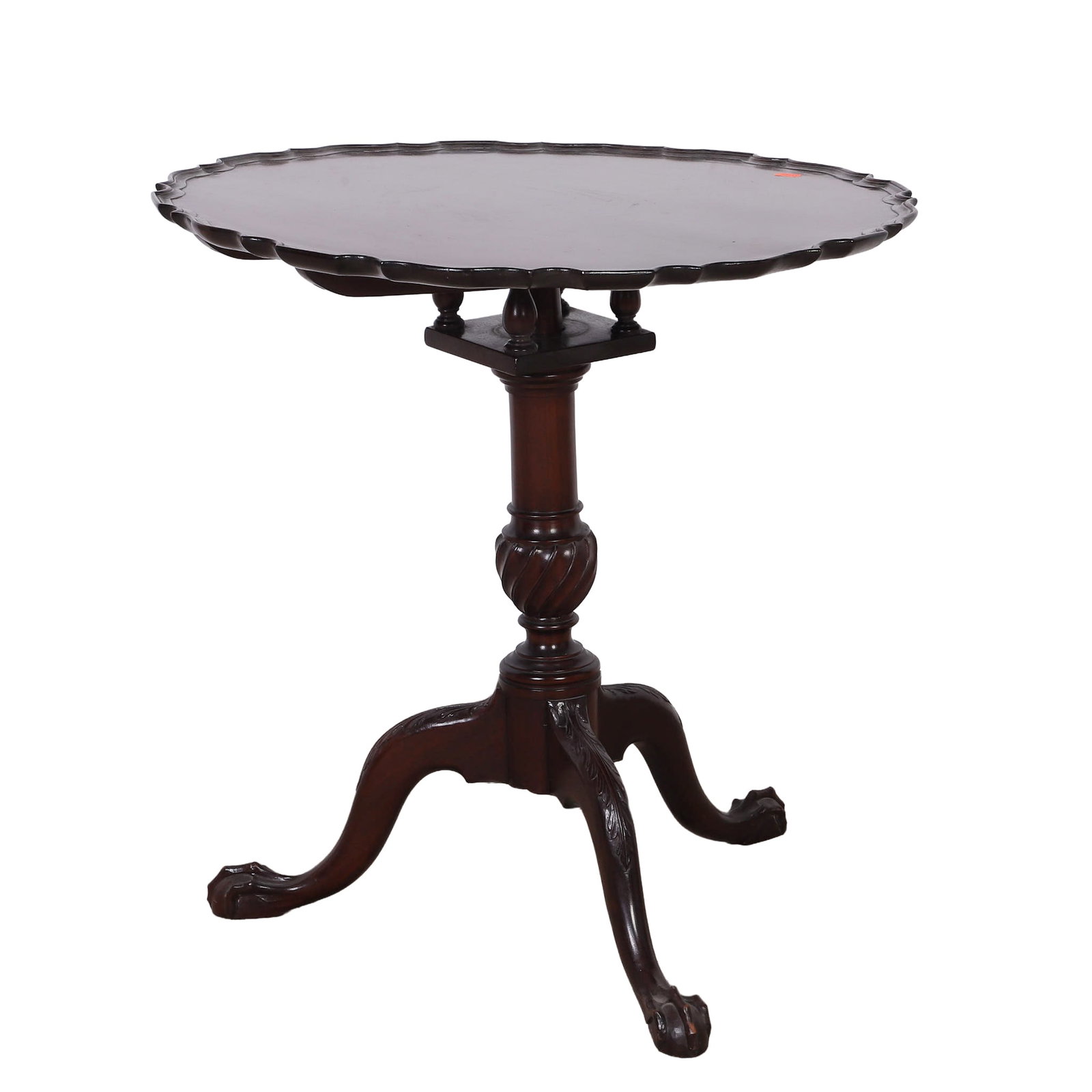 Chippendale Style Pie Crust Tea Table: Chippendale Style Pie Crust Tea Table Mahogany tilt top on birdcage over urn form baluster on acanthus leaf knees and ball and claw feet. 28" H with 28" diameter top. Missing cleat.