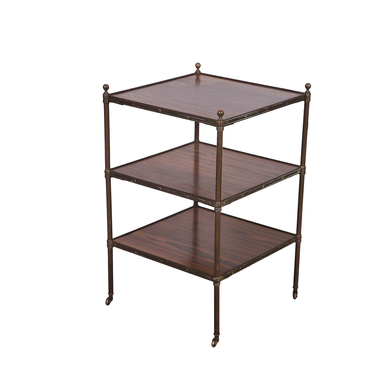 English Regency Three-Tier Brass Etagere, 19th C.: English Regency Three-Tier Brass Etagere, 19th C. Brass ball finials atop a column of shelf supports on brass casters. 28" H x 17" W x 17" D