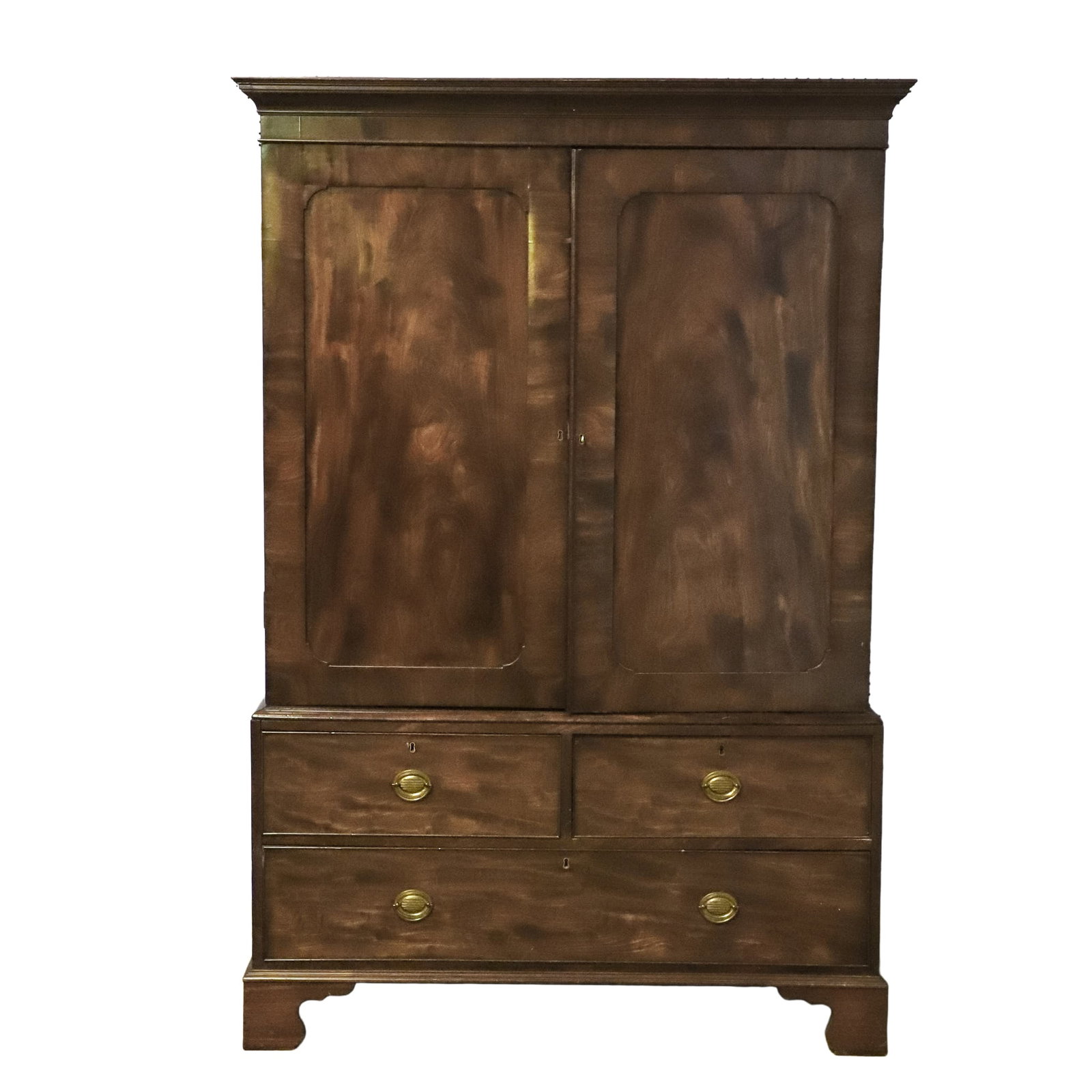 Antique English Regency Linen Press: Antique English Regency Linen Press An early 19th-century flame mahogany veneer, double blind door fitted case over 3 drawers on bracket feet. 76.5" H x 51.5' W x 24" D