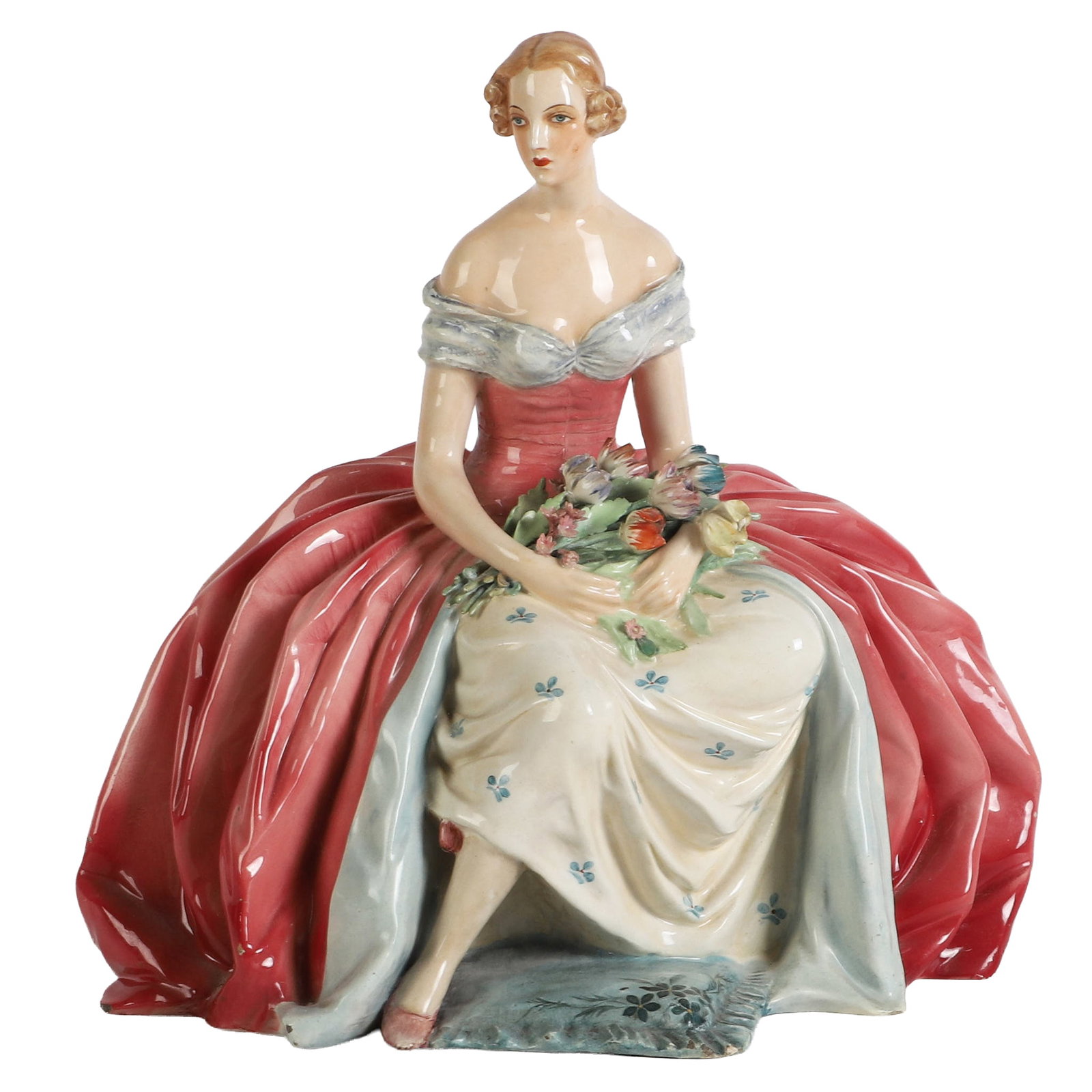 Porcelain Lady Figurine in Gown: Porcelain Lady Figurine in Gown Italian porcelain figurine of a sitting lady in a billowing pink gown holding a bouquet of flowers. No visible makers marks, 12 3/4"H x 13 1/4"W x 10"D