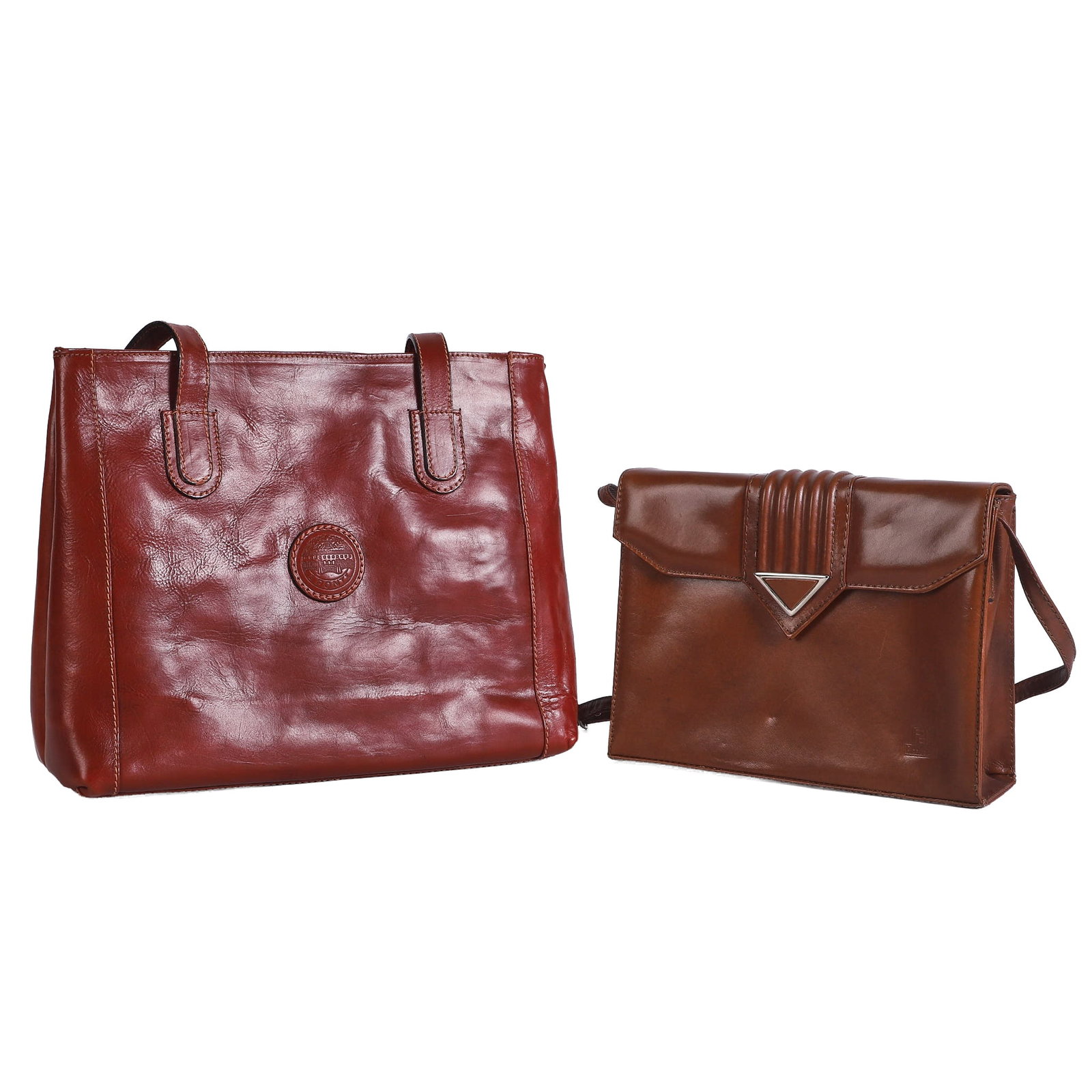 (2) Italian Leather Purses to include I Ponti and Peruzzi: (2) Italian Leather Purses to include I Ponti and Peruzzi (2) Italian Leather Purses to include I Ponti brown leather tote and Peruzzi brown leather handbag with silver tone clasp, wear consistent wit