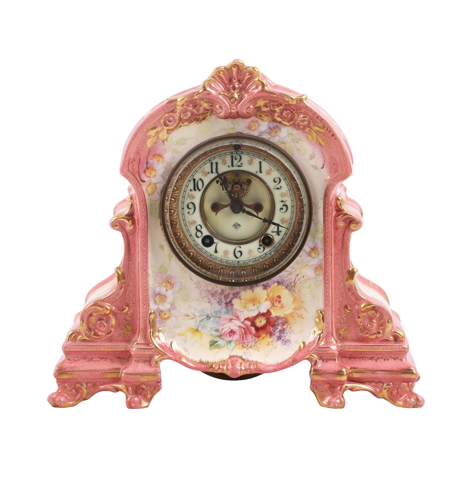 Ansonia Royal Bonn Mantel Clock: Ansonia Royal Bonn porcelain mantle clock in pink with gilt trim and floral decoration, makers mark at back, no chips/cracks noted, functions well. 11 3/4"H x 12 3/4"W x 4 3/4"D