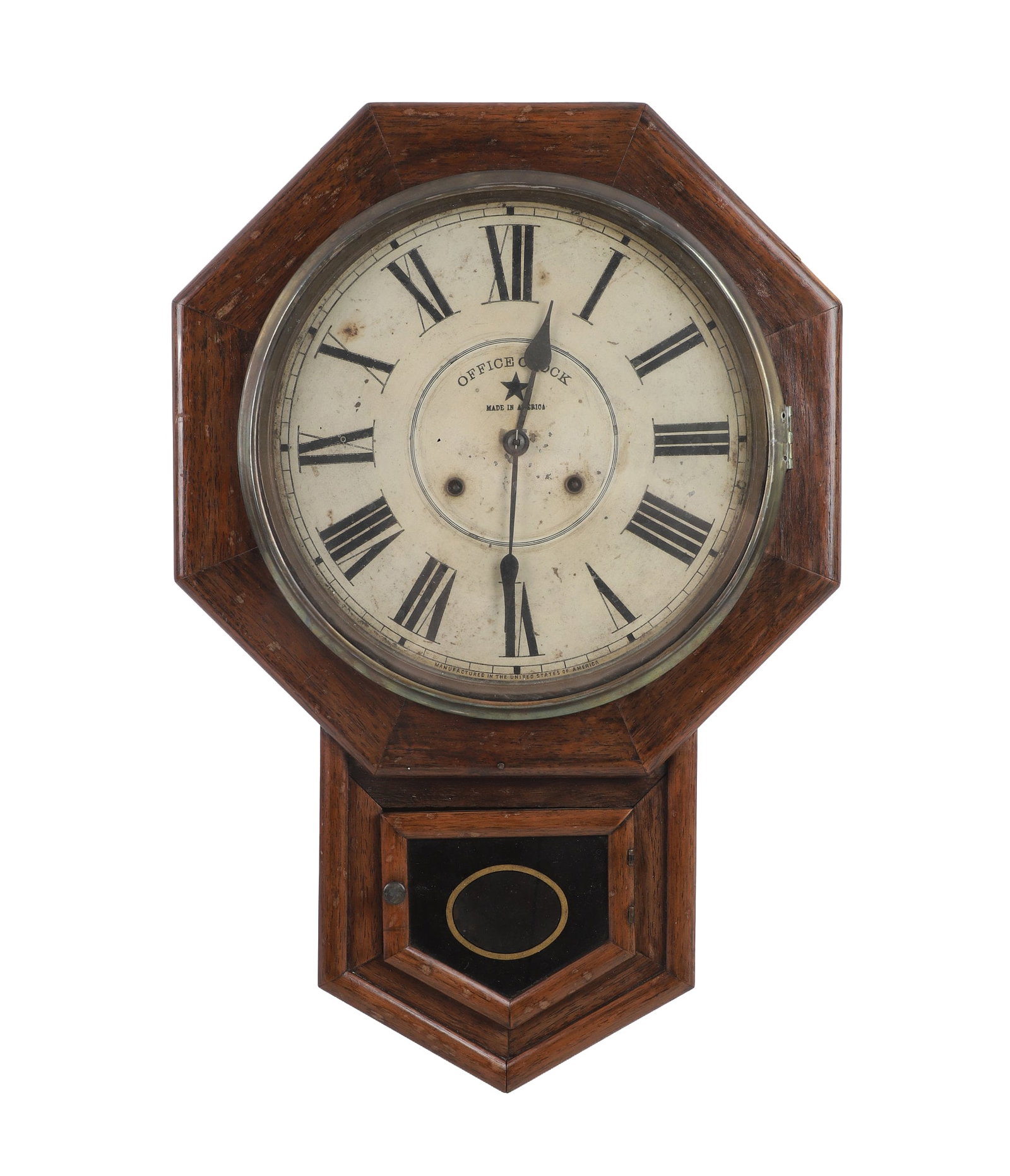 Octagonal Office Wall Clock: Antique office wall clock 'Made in America' in octagonal wooden case, functions well, pendulum included. 23 3/4"H x 16"W x 4 1/2"D