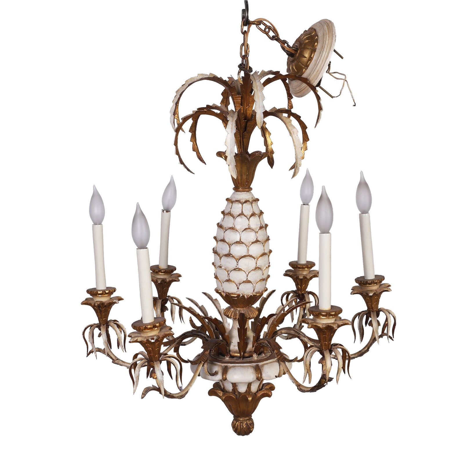 Florentine Style Carved Wood and Tole Pineapple Chandelier: A painted and gilded wood 6-light chandelier with metal fronds and arms. 30" Tall body and 26" diameter