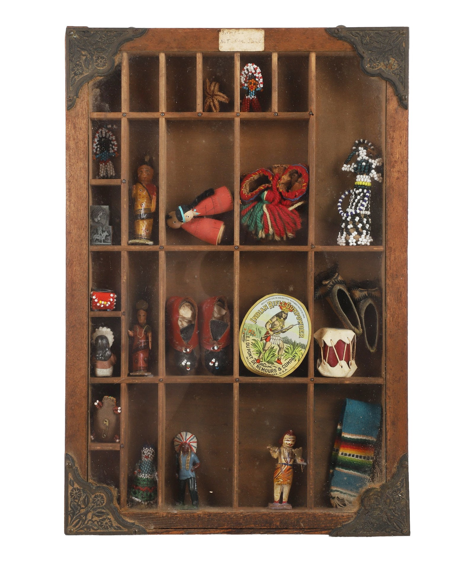 American Indian Miniatures in Display Case: Collection of miniatures focused around American Indian depictions and culture all in a sealed custom display case made from a printers tray. 16 1/4" x 11 1/4"
