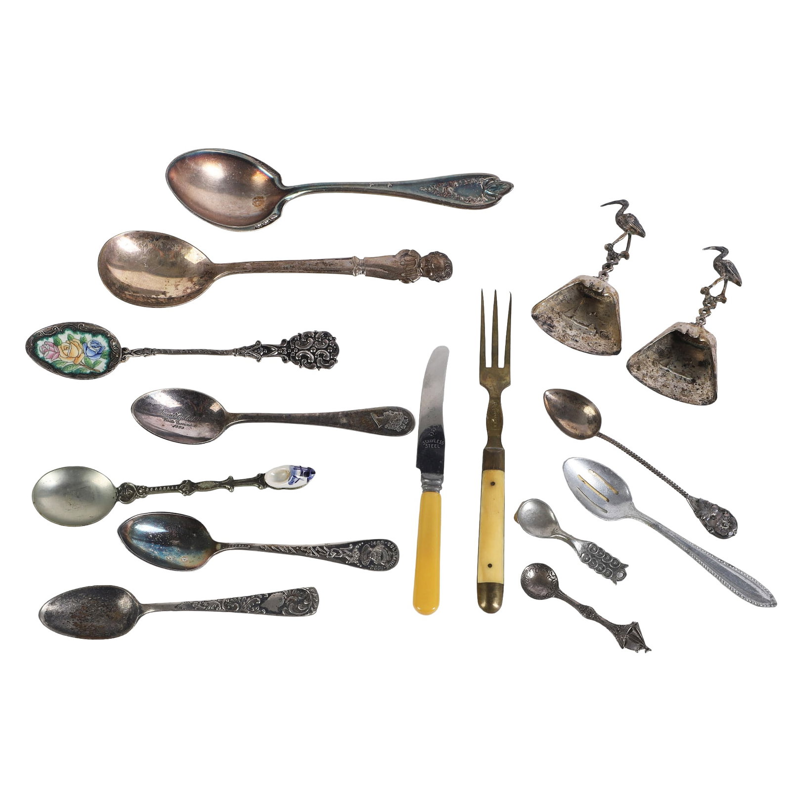 Silver Plate, Sterling & Commemorative Utensils: Collection of decorative spoons including featuring silver plate, enamel, and (2) sterling silver spoons (400 year Columbus anniversary spoon & miniature sailing ship spoon, though the latter is marke