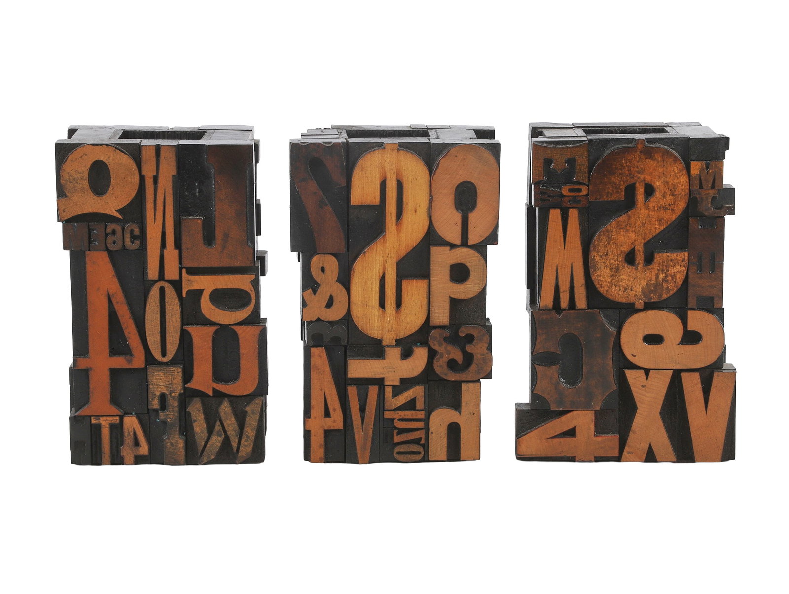 Trio of Sculptural Typography Vases: Trio of Sculptural Typography Vases Trio of sculptural typography vases assembled from a variety of wooden type blocks by artist Sy Blinn, signed at the base by Sy Blinn. Each approx. 8"H x 4"W x 5"L