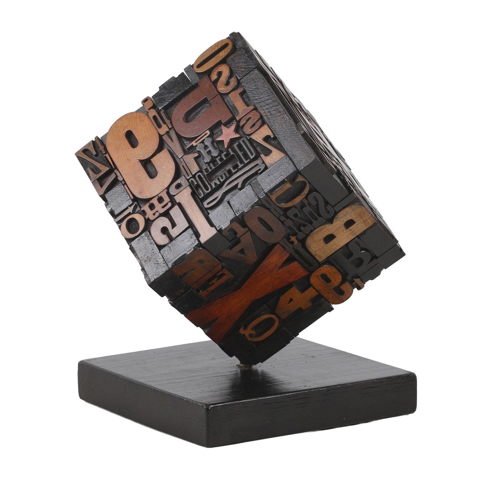 Typography Cube Sculpture by Sy Blinn: Typography Cube Sculpture by Sy Blinn Hand crafted sculpture of a cube composed entirely out of wooden type blocks with unique characters and glyphs on each face. Supported on rotating axel base,