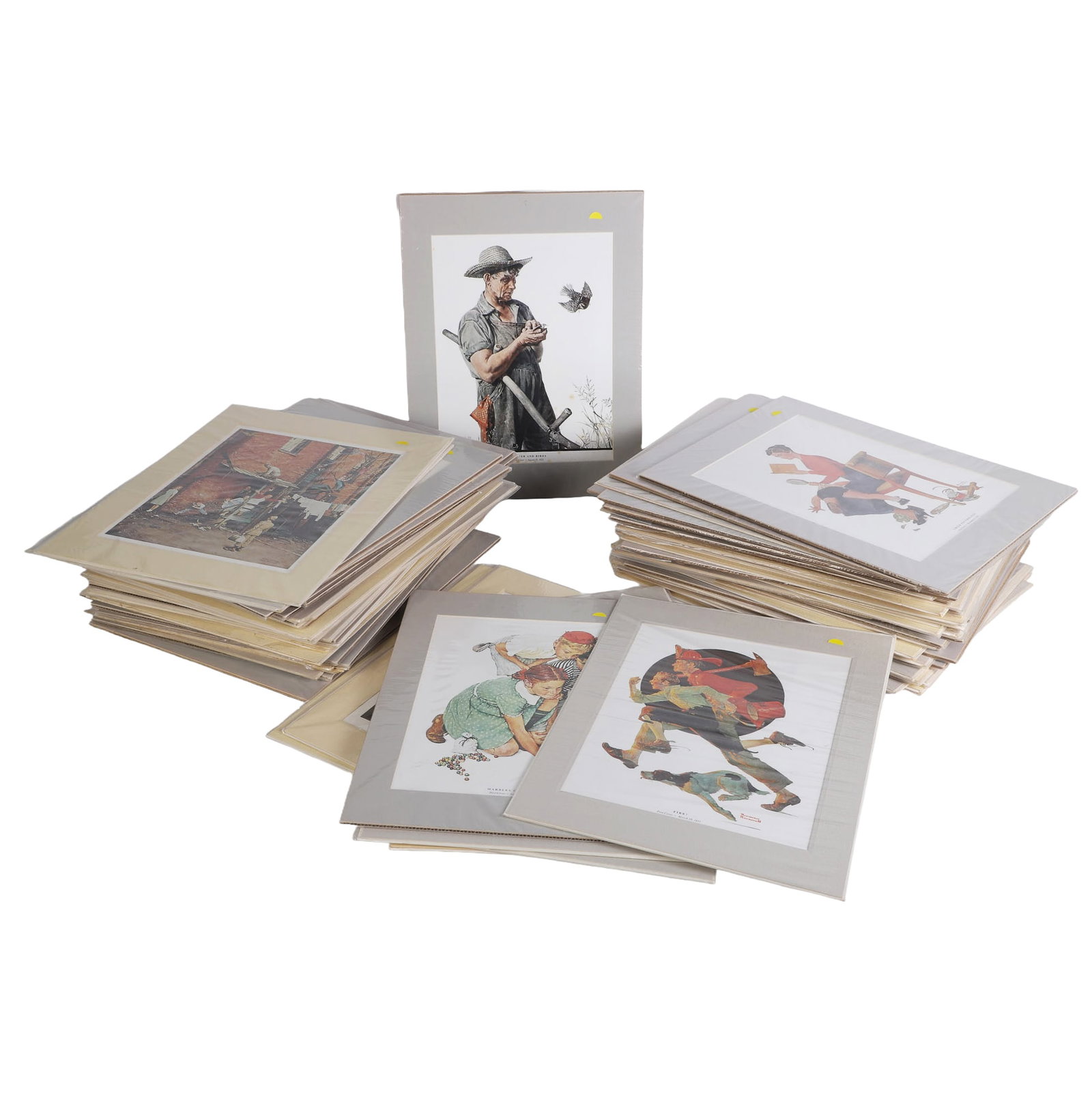 Dealer's Lot of Norman Rockwell Prints & Original Ads: Dealer's Lot of Norman Rockwell Prints & Original Ads 70+ Lot of Norman Rockwell prints and original magazine advertisements all in 18" x 14" cardboard frames. Wide variety of subject matter, a