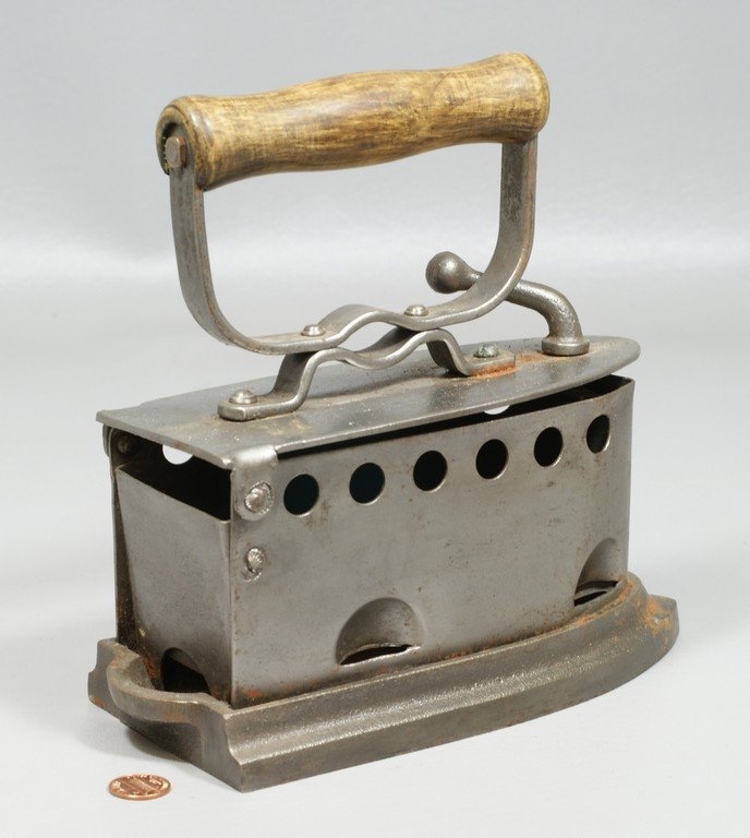 Unusual charcoal Iron with raised out sole, 8-3/4": Unusual charcoal Iron with raised out sole, 8-3/4" long, 8-1/2" high