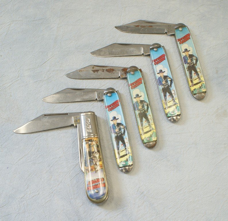 (5) Hopalong Cassidy pocket knives, one marked "Novelty: (5) Hopalong Cassidy pocket knives, one marked "Novelty Cutlery Ireland", 3 marked "USA", one marked "USA Barlow", 3 1/2" long