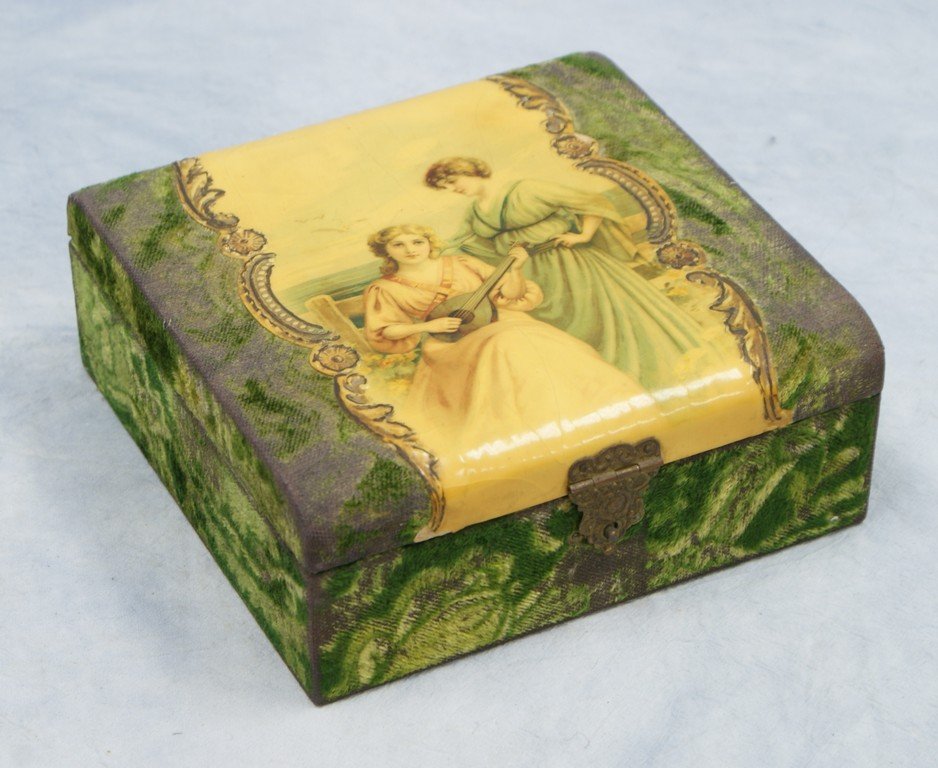 Victorian Celluloid and Velvet Dresser Box with women: Victorian Celluloid and Velvet Dresser Box with women decoration, contains handkerchiefs, 6-1/2" square x 2-1/2" h