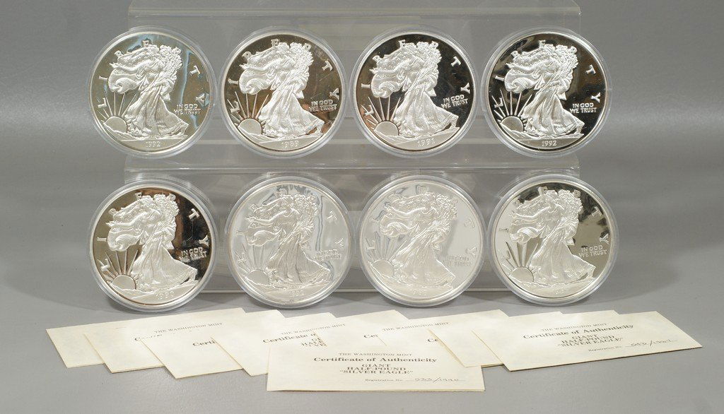 (8) Washington Mint Giant Half Pound Silver Eagle - 8: (8) Washington Mint Giant Half Pound Silver Eagle - 8 Troy Oz, .999 fine silver, 1987 to 1992 with (3) 1992 coins, in plastic cases, 64 TO total weight, with COA's