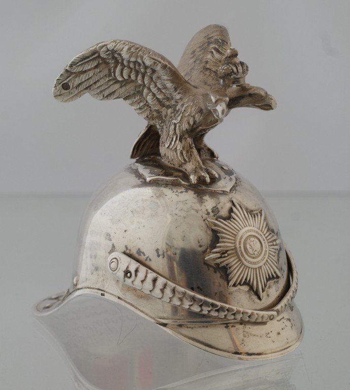Russian Imperial helmet form silver cup, with an: Russian Imperial helmet form silver cup, with an articulated chin strap and surmounted by an Imperial eagle. Bearing marks "84", makers mark of Gabriel and Michael Grachev, Kokoshnik mark with assayer