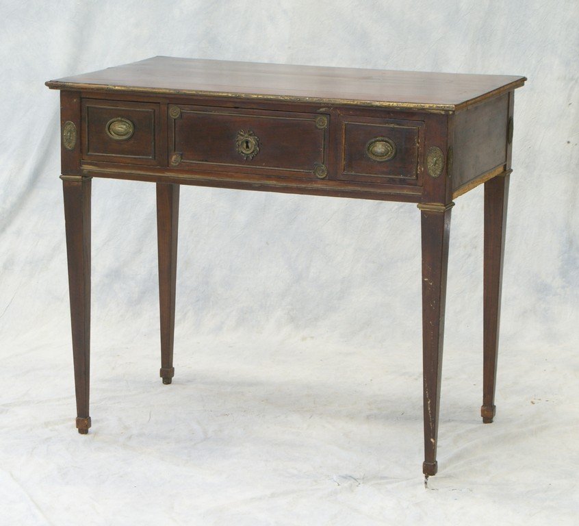 Regency mahogany dressing table with 3 drawers,: Regency mahogany dressing table with 3 drawers, original pulls, brass beadwork and rosettes, brass trim missing on right edge of top, some splits and losses around top, 33" w x 20" d x 29" h, 19th C