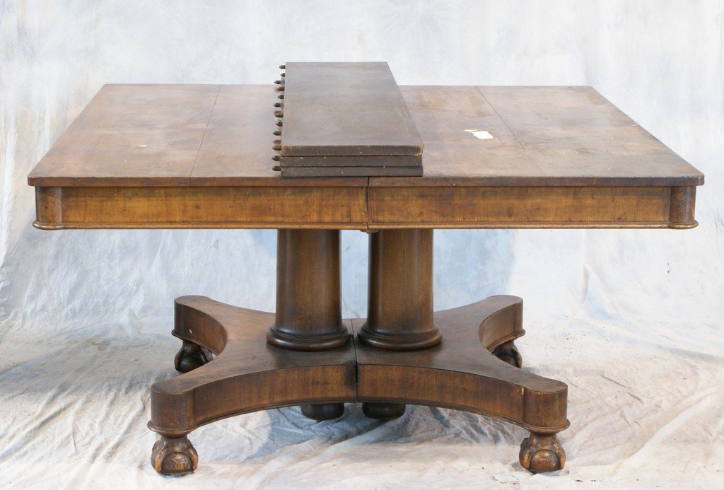 Square mahogany pedestal dining room table on platform: Square mahogany pedestal dining room table on platform base with claw & ball feet, 3 11 1/4" leaves, table 54" square, top with some water stains and imperfections