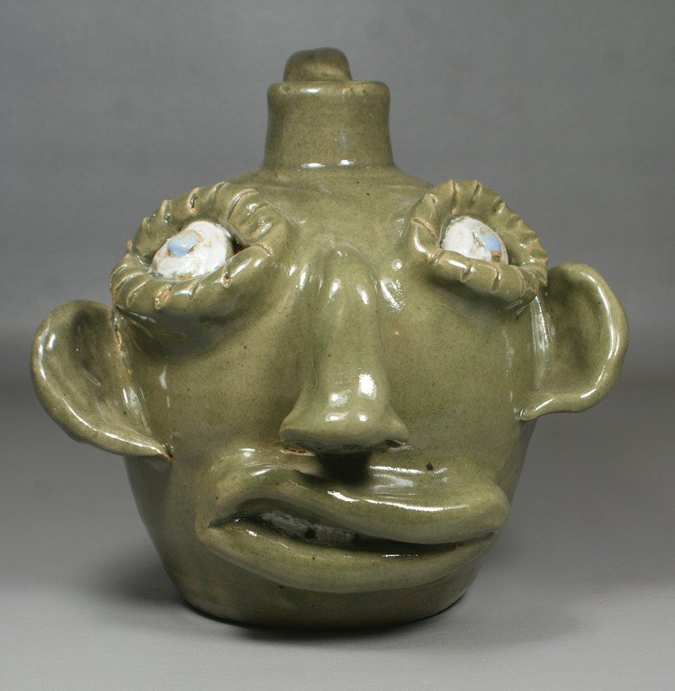 Jerry Brown Pottery face jug, Hamilton, AL, 8 1/4" h,: Jerry Brown Pottery face jug, Hamilton, AL, 8 1/4" h, inscribed "For Roy Thompson", no damage