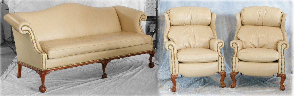 Tan leather upholstered Chippendale style sofa with 2: Tan leather upholstered Chippendale style sofa with 2 recliners by Hancock & Moore, sofa 84" l x 36" h, recliners 42" h x 33", original cost $******