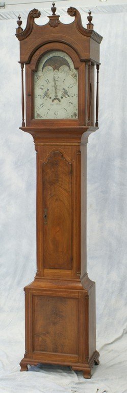 Inlaid walnut tall case clock by Peter Miller,: Inlaid walnut tall case clock by Peter Miller, Lynnville, Lehigh County, PA, c 1800. Broken scroll top bonnet containing an 8 day brass movement, waist with an arched scalloped top door flanked by ins