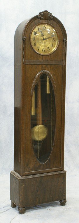 German oak hall clock, round hammered brass dial, 2: German oak hall clock, round hammered brass dial, 2 weight pull chain drive, wire chimes, 80" tall