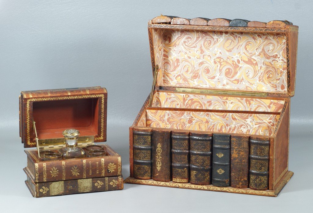 2 Antique Book Boxes, refitted one as a Tantalus with: 2 Antique Book Boxes, refitted one as a Tantalus with liquor bottle and 4 glasses, the other as a letter box, the largest 8" high
