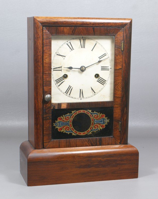 Seth Thomas rosewood veneer 30 hr cottage clock, time: Seth Thomas rosewood veneer 30 hr cottage clock, time and strike, good paper label, 14 1/4" h, small veneer loss