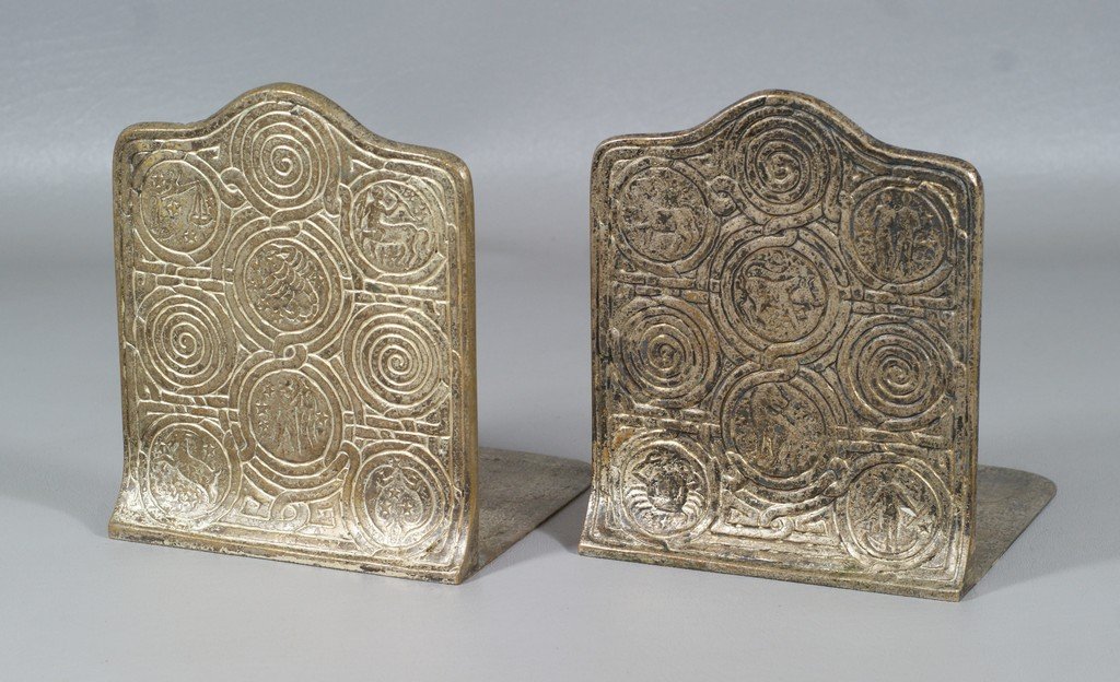 Pair of Tiffany Studios Zodiac bookends, silvered: Pair of Tiffany Studios Zodiac bookends, silvered bronze, signed "Tiffany Studios New York 1091" to base, 6" h