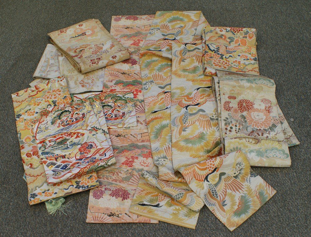 13 Japanese Obi, including 4 full sized, 9 of assorted: 13 Japanese Obi, including 4 full sized, 9 of assorted length, together with 3 contemporary silk table runners