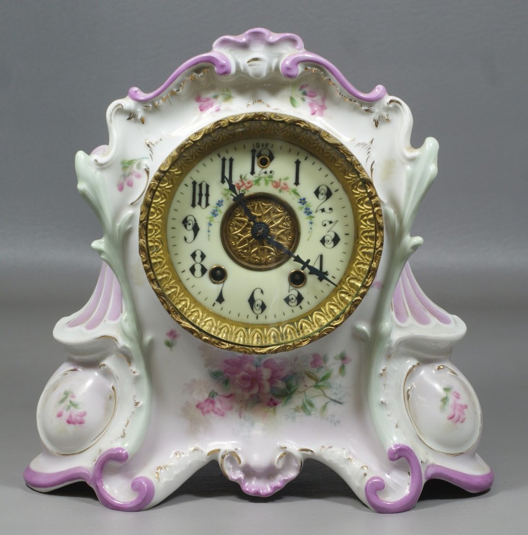 Gilbert Connecticut Clock Movement in a Porcelain Case,: Gilbert Connecticut Clock Movement in a Porcelain Case, decorated with pale pink and flowers, 10-3/4" high