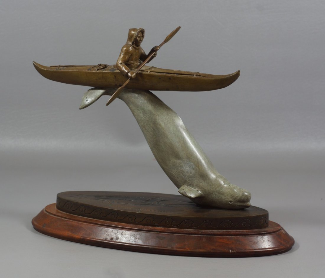 Joel Tea, American, PA, late 20th c, Bronze Sculpture,: Joel Tea, American, PA, late 20th c, Bronze Sculpture, "Inuit Legacy", man in kayak lifted by whale, #3020, dated 1991, numbered 21/100, 14" wide at base, 11" h including walnut base