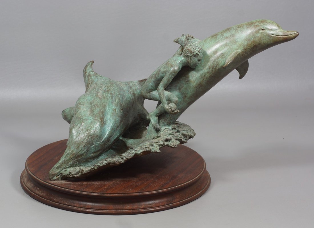 Joel Tea, American, PA, late 20th c, Bronze Sculpture,: Joel Tea, American, PA, late 20th c, Bronze Sculpture, "Shell Hunt", Boy Riding on Dolphin & Conch Shell, dated 1989, numbered 10/100, 16" wide, 9 3/4" h including walnut base