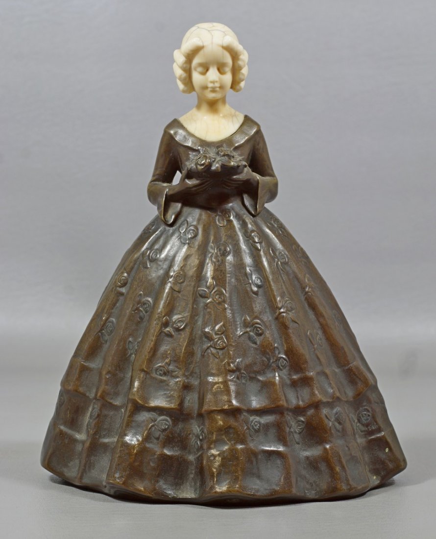 Peter Tereszczuk, Austrian, 1875-1963, Bronze Girl with: Peter Tereszczuk, Austrian, 1875-1963, Bronze Girl with Ivory head, holding flowers, 9-1/2" high. We adhere strictly to all state and Federal laws pertaining to the sale, shipping, and export of any i