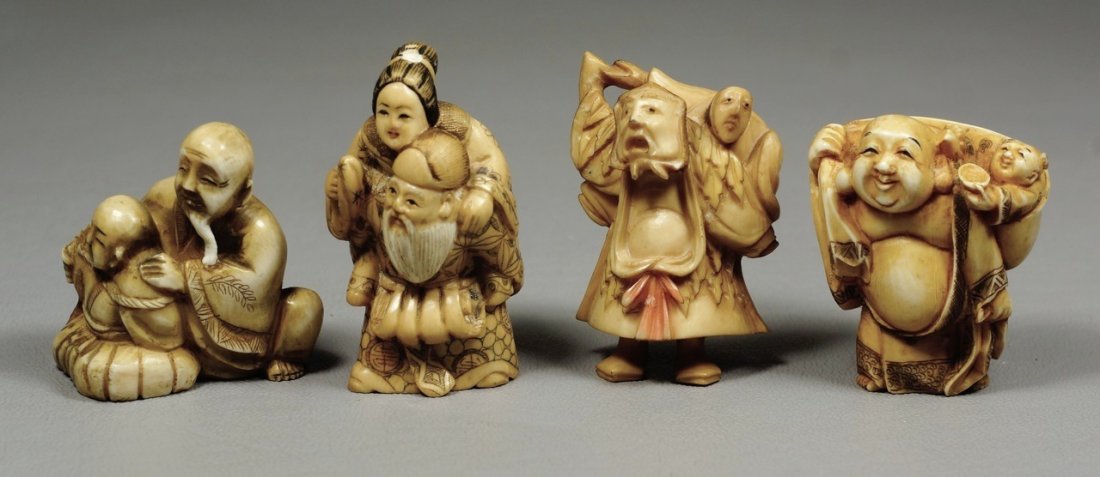 (4) carved ivory Japanese netsuke, figures holding: (4) carved ivory Japanese netsuke, figures holding other figures, three signed, tallest 2". We adhere strictly to all state and Federal laws pertaining to the sale, shipping, and export of any items c