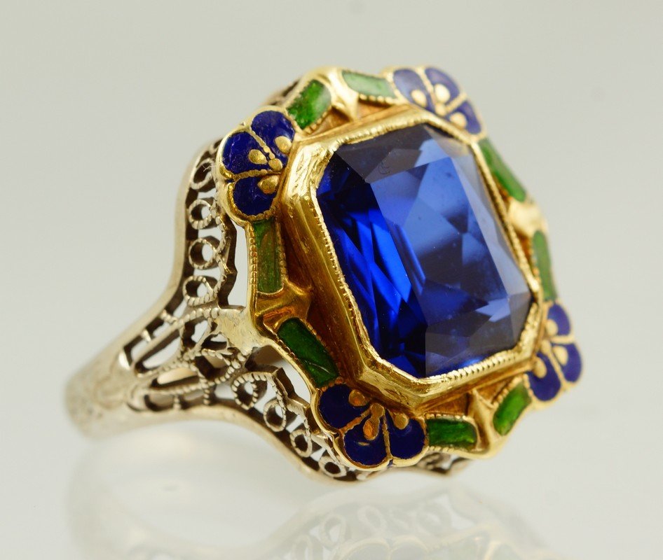 14K WG filigree enameled ring with emerald cut blue: 14K WG filigree enameled ring with emerald cut blue stone, size 6, 2.0 dwt