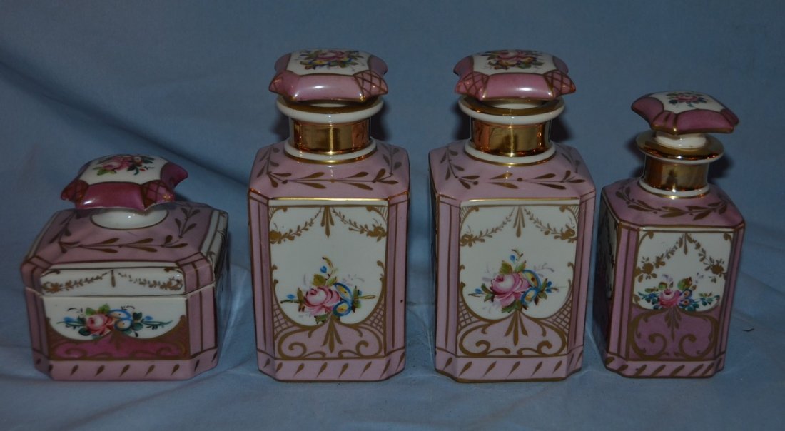 3 French porcelain dresser bottles and one covered jar,: 3 French porcelain dresser bottles and one covered jar, pink ground with gilt and floral decoration, the tallest 6 3/4".