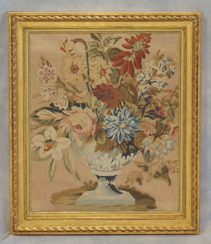 Needlepoint panel depicting a floral urn, gilt frame,: Needlepoint panel depicting a floral urn, gilt frame, 25" x 21 1/2" overall