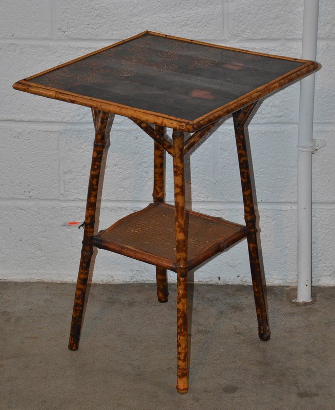 Bamboo and rattan square lamp table with lacquer: Bamboo and rattan square lamp table with lacquer decorated top, 28" high, 18 1/2" square.