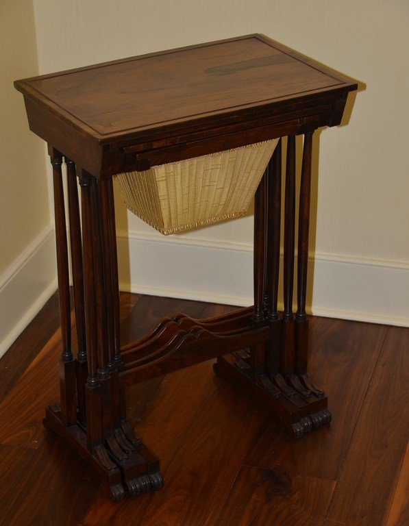 Nest 4 rosewood Regency occasional tables with sewing: Nest 4 rosewood Regency occasional tables with sewing basket, one top inlaid with a checker/chess board, early 19th c